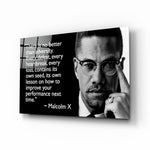 Words of Malcolm X glass wall art in a modern study
