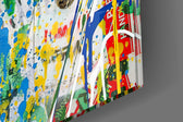 Superman Be Your Own Hero glass wall art catching light to reveal its painted drips