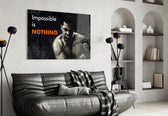 Ali Impossible Is Nothing artwork styled in a teen's bedroom interior