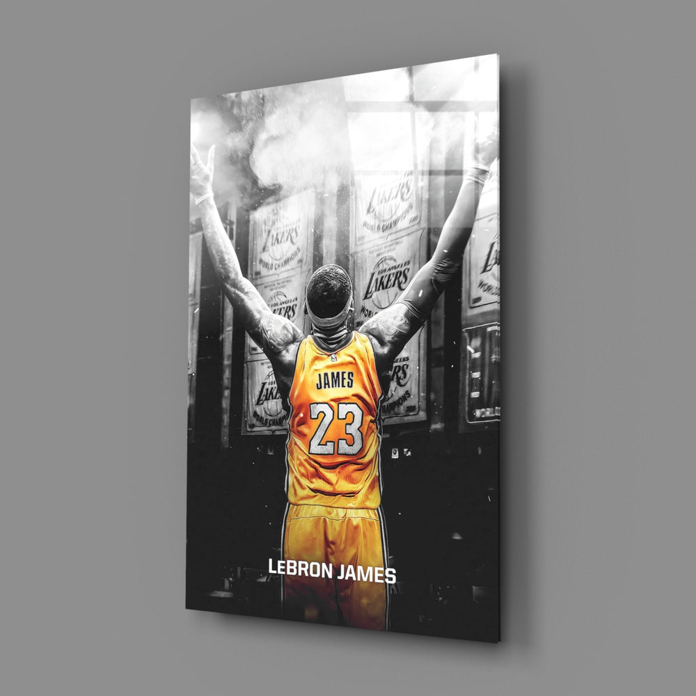 Close-up detail of LeBron with arms raised behind glass