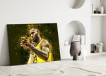 Close-up detail of LeBron finger-gun celebration behind glass