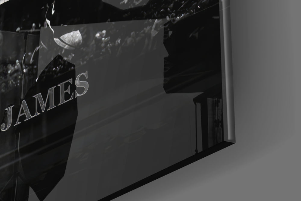 LeBron James Defy the Odds glass wall art catching light to reveal its painted typography