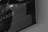 LeBron James Defy the Odds glass wall art catching light to reveal its painted typography
