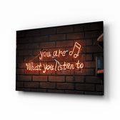 Music-quote neon panel anchoring a creative loft wall