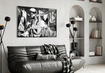 Guernica artwork styled in a home library interior