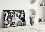 Close-up detail of Picasso Guernica behind glass