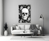 Close-up detail of monochrome skull and roses behind glass