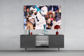 Cam Newton glass wall art catching light to reveal its painted bokeh