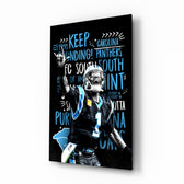 Cam Newton glass wall art in a modern home cinema