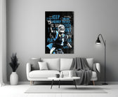 Close-up detail of Cam Newton Keep Pounding poster behind glass