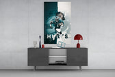 Jalen Hurts glass wall art catching light to reveal its painted typography