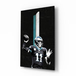 Carson Wentz glass wall art in a modern home cinema