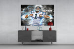 Cam Newton glass wall art catching light to reveal its painted plasma