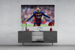 Messi glass wall art catching light to reveal its painted bokeh