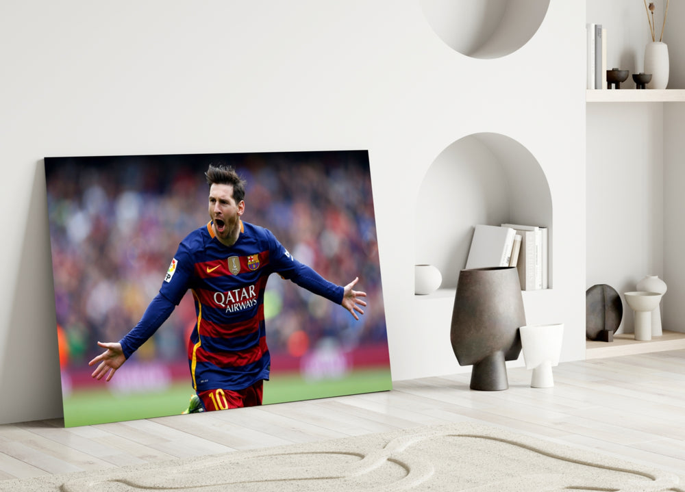 Close-up detail of Messi celebration behind glass