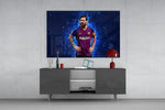 Messi glass wall art catching light to reveal its painted plasma
