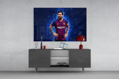 Messi glass wall art catching light to reveal its painted plasma