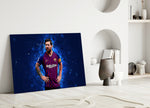 Close-up detail of Messi cobalt plasma portrait behind glass