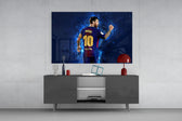 Messi glass wall art catching light to reveal its painted plasma