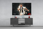 Cristiano Ronaldo glass wall art catching light to reveal its painted sparks