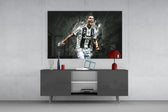 Cristiano Ronaldo glass wall art catching light to reveal its painted grunge