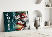 Close-up detail of comic Joker grin behind glass