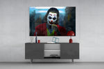 Joker glass wall art catching light to reveal its painted smoke