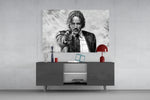 John Wick glass wall art catching light to reveal its painted ink