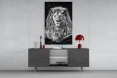 Lion glass wall art catching light to reveal its painted mane