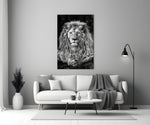 Close-up detail of monochrome lion behind glass