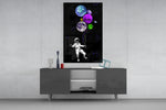 Baloonets glass wall art catching light to reveal its painted balloons