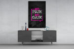 No Pain No Gain glass wall art catching light to reveal its painted bubble