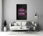 Close-up detail of magenta No Pain No Gain bubble behind glass