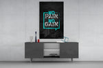 No Pain No Gain glass wall art catching light to reveal its painted bubble