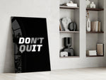Motivational panel against a moody dark-painted accent wall