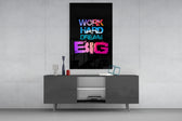 Dream Big glass wall art catching light to reveal its painted gradient