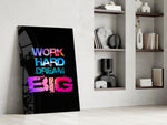 Motivational panel against a moody dark-painted accent wall