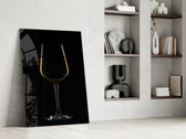 Still-life panel against a moody dark-painted accent wall