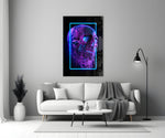 Close-up detail of magenta wireframe skull behind glass