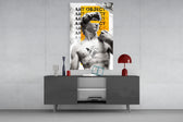 Art Object glass wall art catching light to reveal its painted newsprint