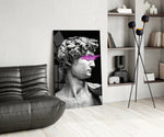 Pop-classical glass print bringing dada edge to a study
