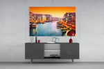 Venice glass wall art catching light to reveal its painted gondola
