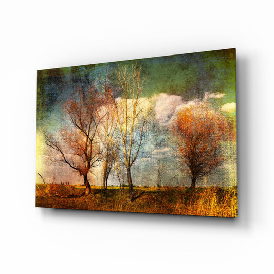 Autumn Trees glass wall art in a modern living room