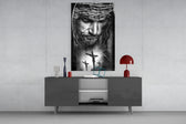 Jesus glass wall art catching light to reveal its painted thorns