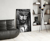 Sacred glass print bringing devotional edge to a moody bedroom