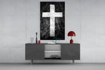 Cross glass wall art catching light to reveal its painted grunge