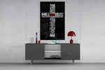 Cross glass wall art catching light to reveal its painted GOD accent