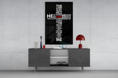 Cross glass wall art catching light to reveal its painted GOD accent