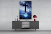 Cross glass wall art catching light to reveal its painted nebula
