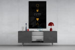 We are Healed glass wall art catching light to reveal its painted gold